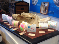 A fleet of colourful sailing boats made by children under the instruction of Margaret Taylor-Hill.